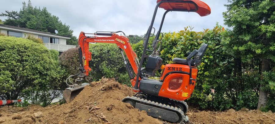 Mini digger in action - Hot Diggety, Wellington